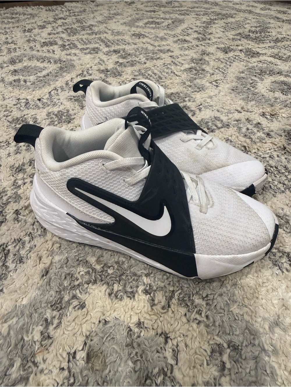 Nike youth basketball shoes.